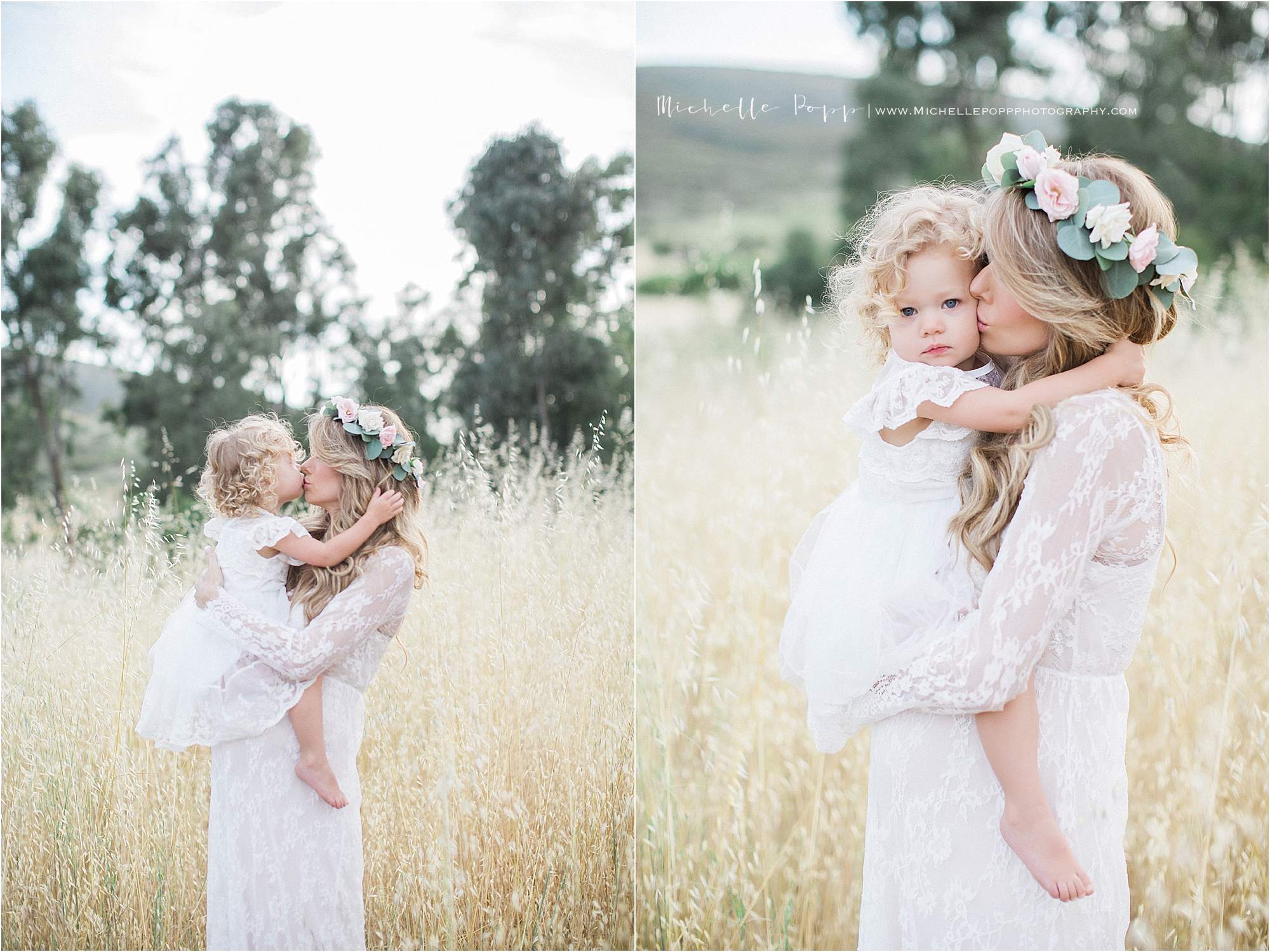 mom kissing daughter on cheek 