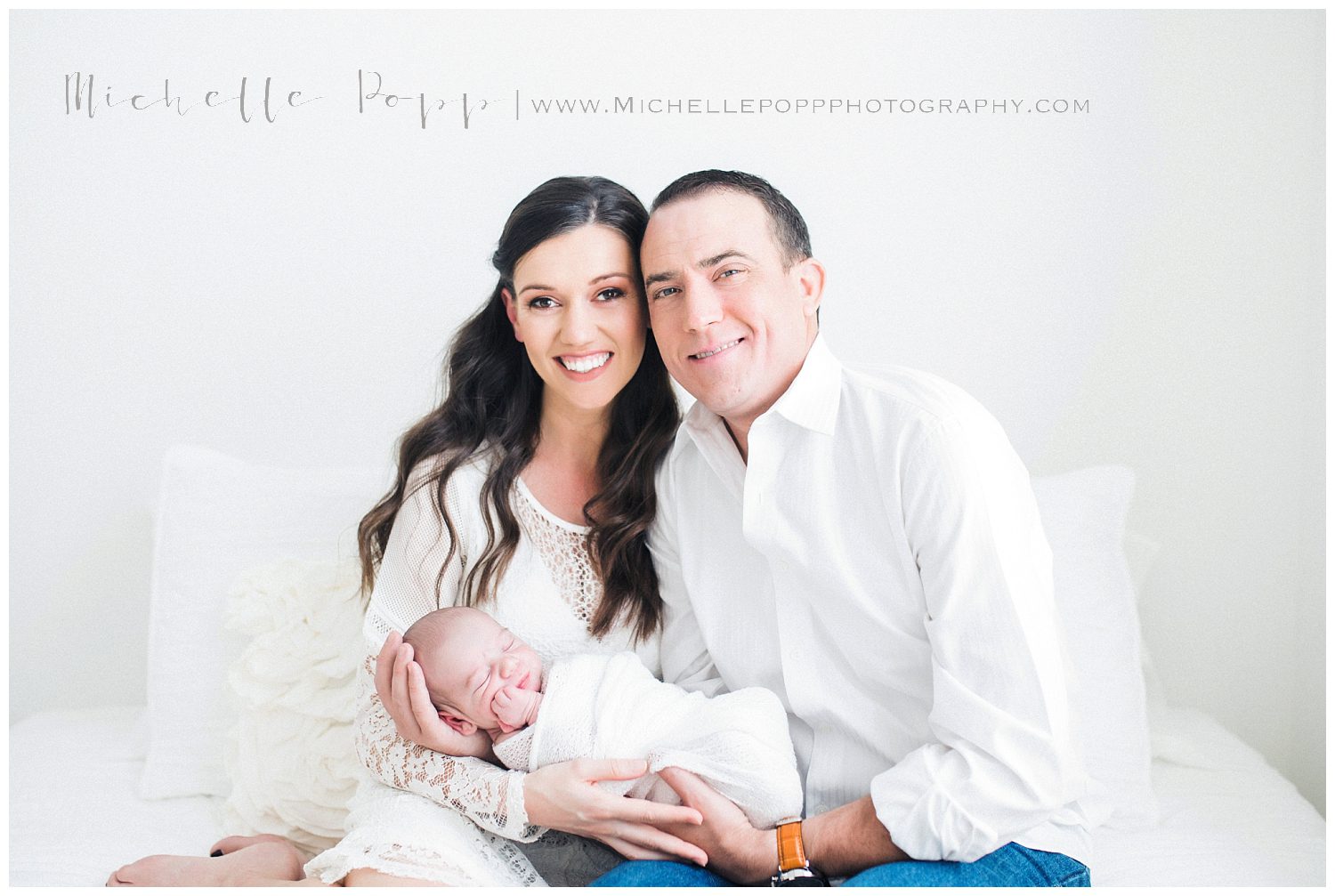 adorable family welcoming new son during newborn session in san diego