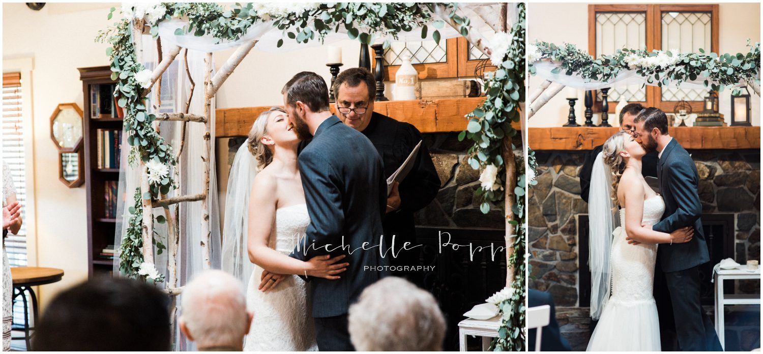 the bride and grooms first kiss