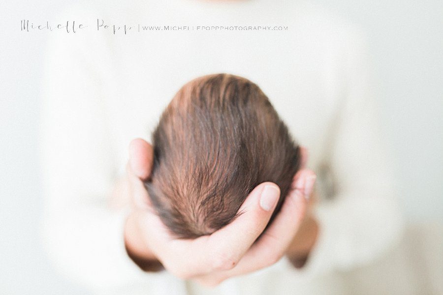 natural newborn photography of baby's head