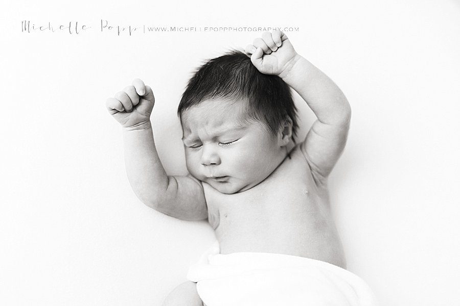 Natural newborn photography in studio 