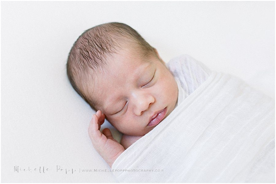 sleeping newborn baby during a newborn photography session