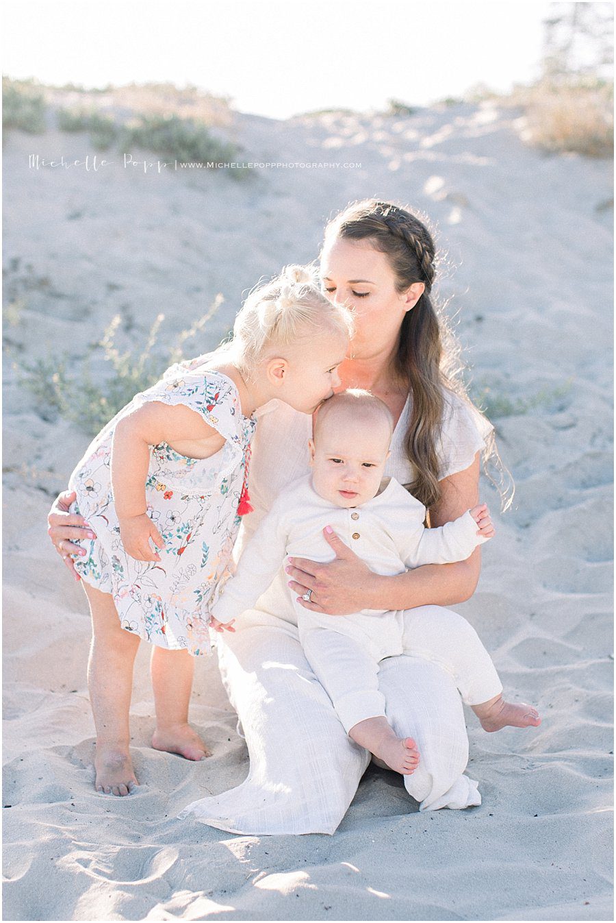 happy family on Coronado Beach during a photography session