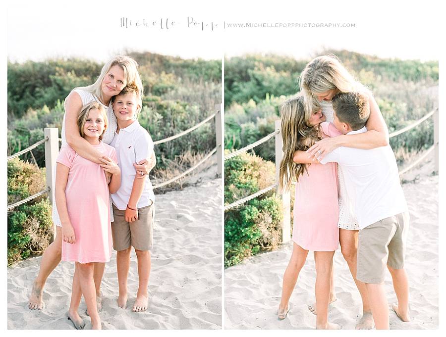 mom hugging two kids at beach