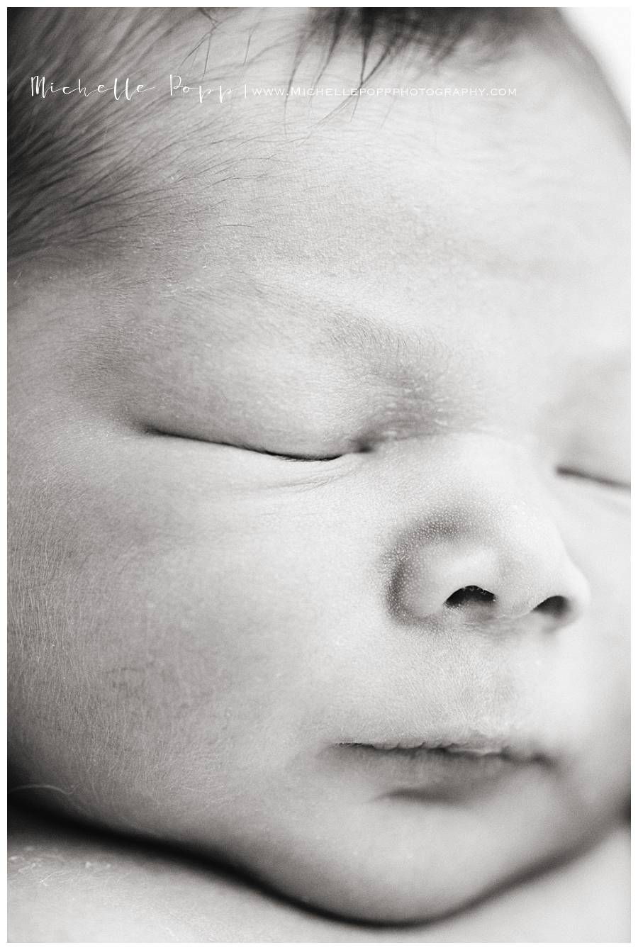 newborn baby eyes closed close up
