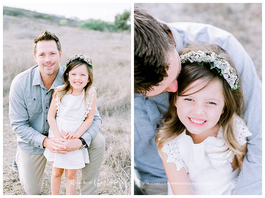 dad and daughter in field smiling 