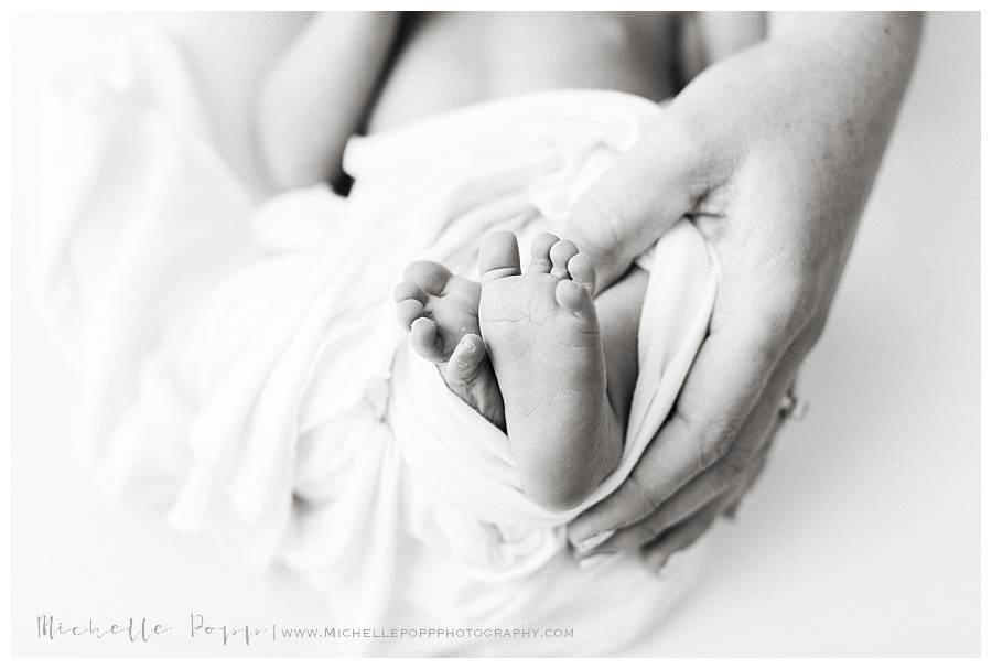 newborn baby toes up close