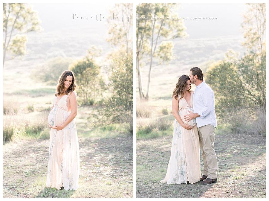 dad kissing mom on forehead in field