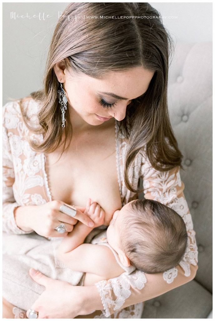 mom breastfeeding 6 month old baby