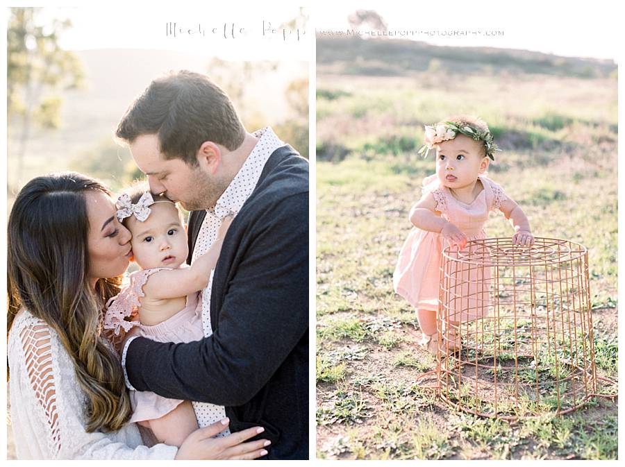 parents kissing baby girl on cheek