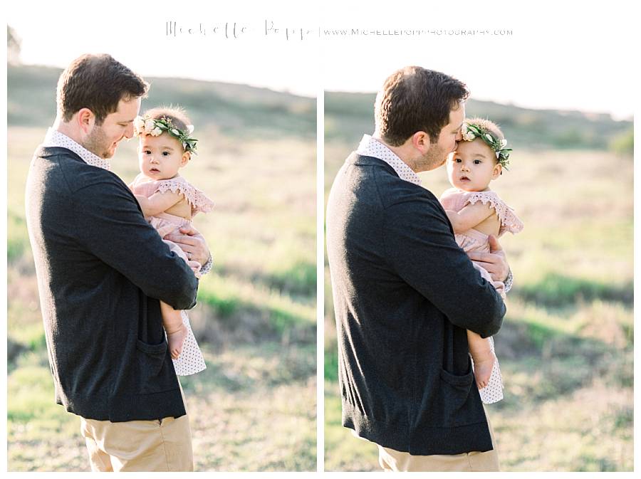 dad kissing baby girl