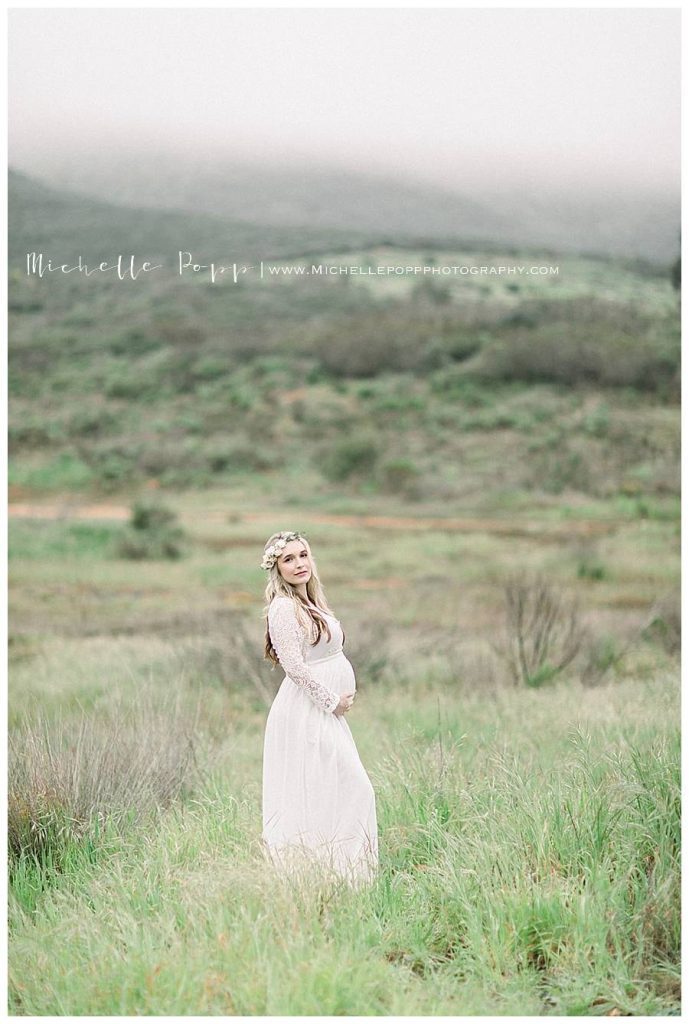 woman in white dress in a field