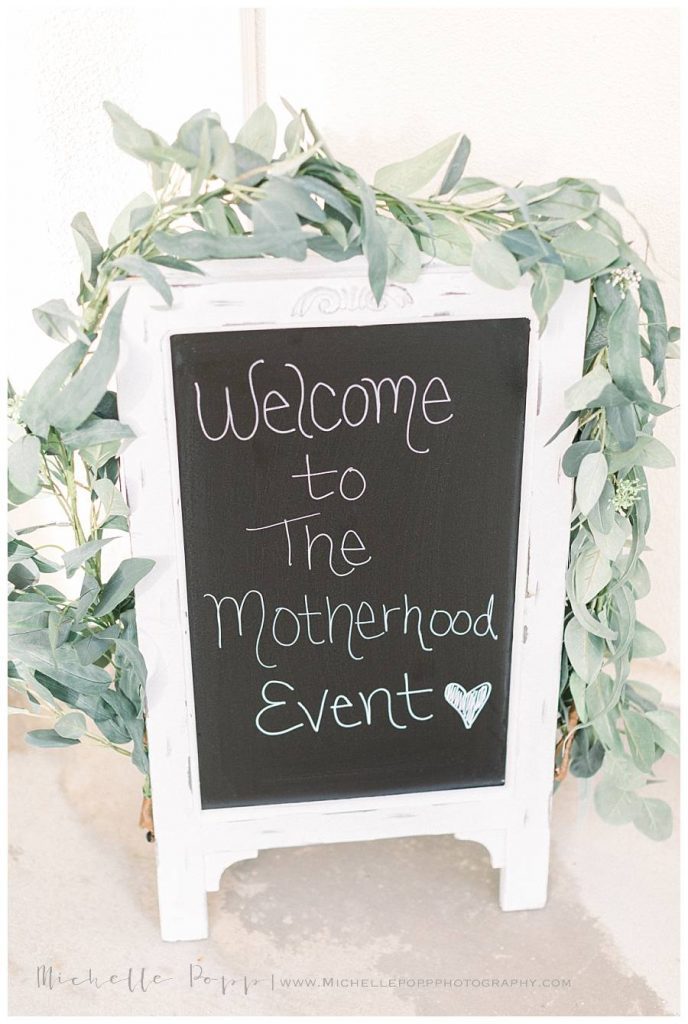welcome sign for motherhood event