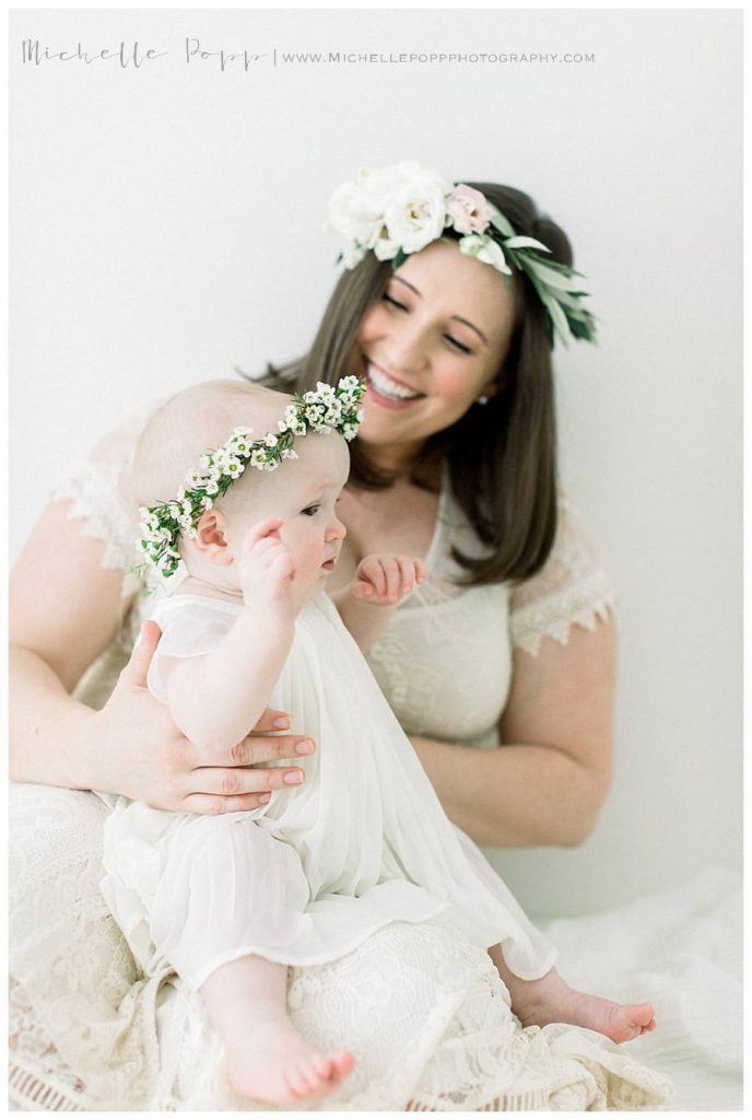 mom and daughter in flower crowns