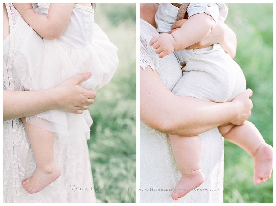 mom holding baby in arms