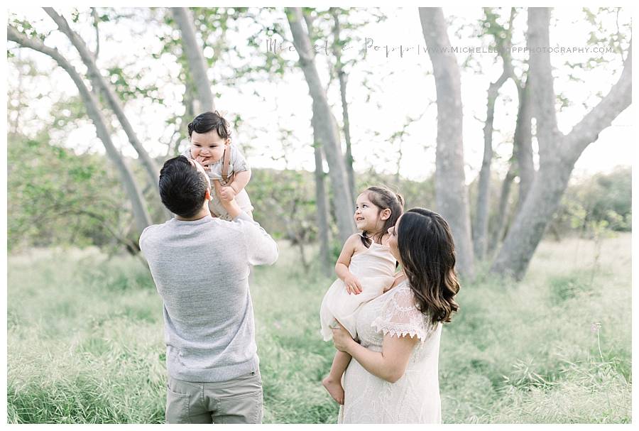 family of four in field