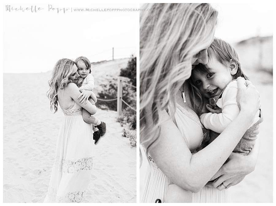 black and white of mom and son at beach