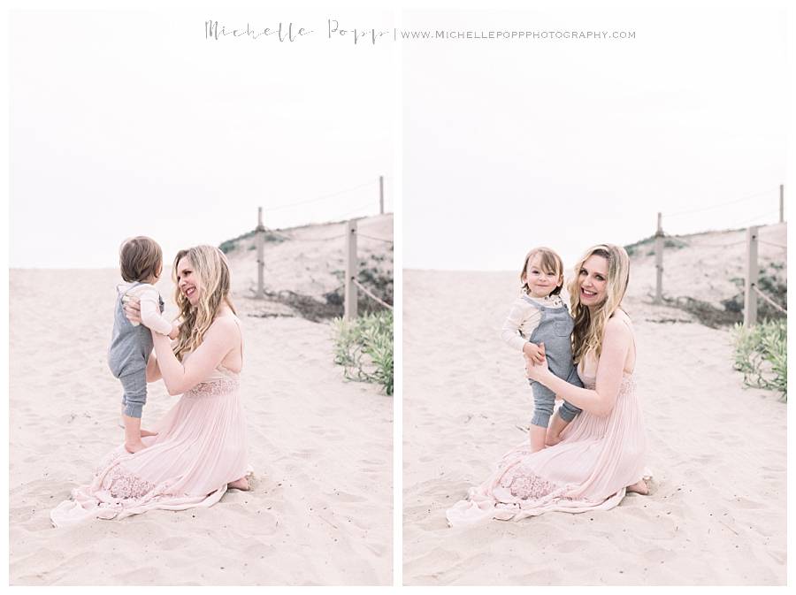 mom and son at beach on sand