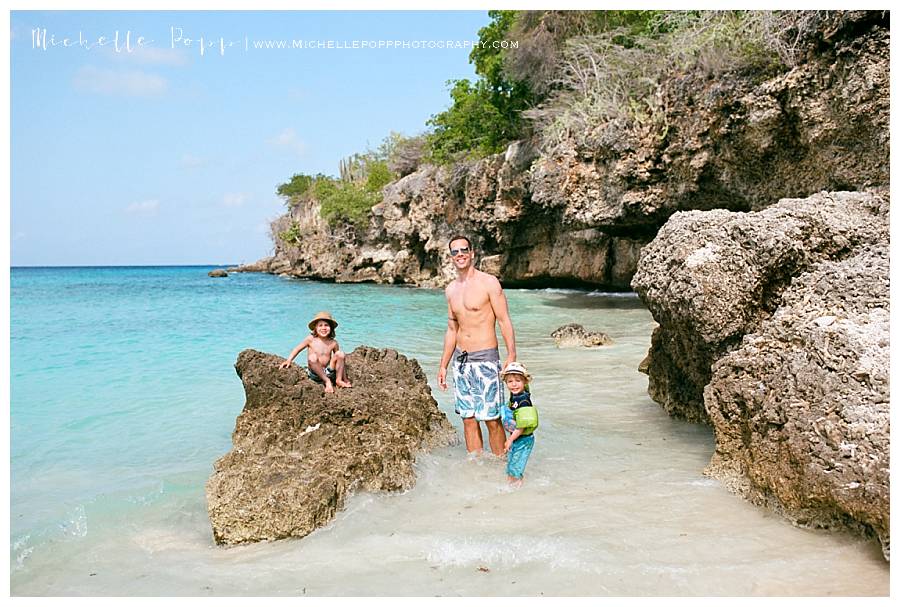 dad and sons at the beach