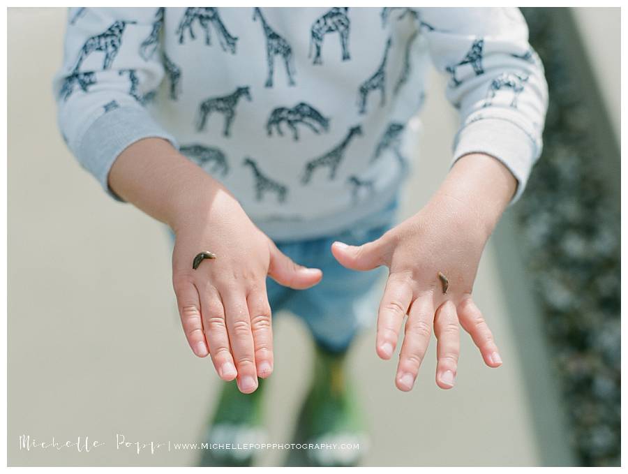 boy with bug on hand