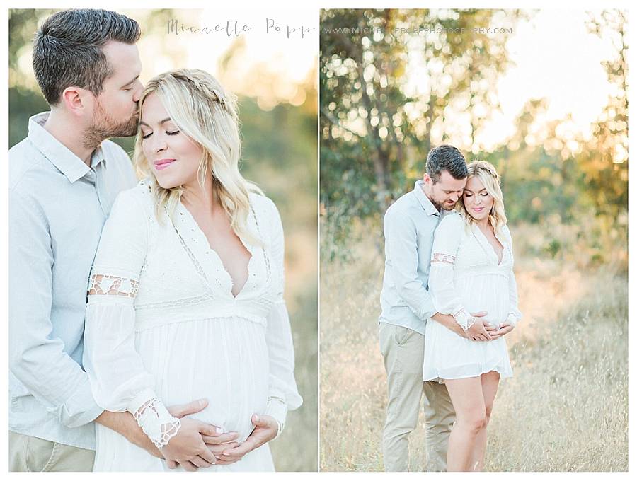 expectant mama and dad in field