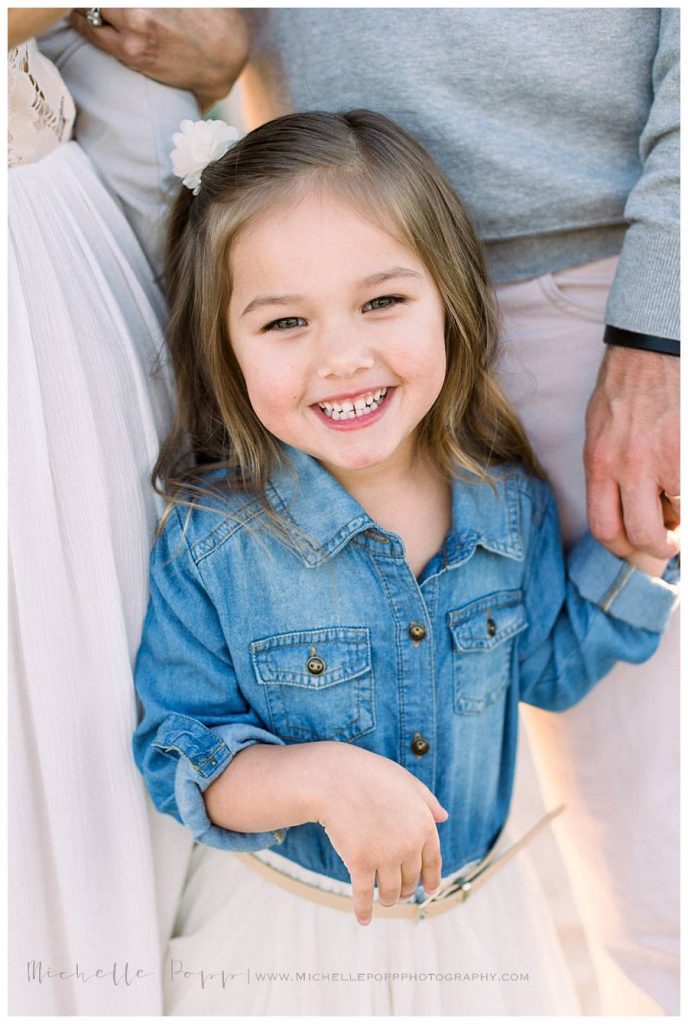 little girl smiling at camera