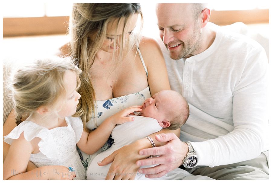 family together on bed