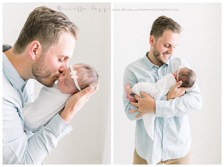 dad snuggling new baby girl Intimate newborn photography