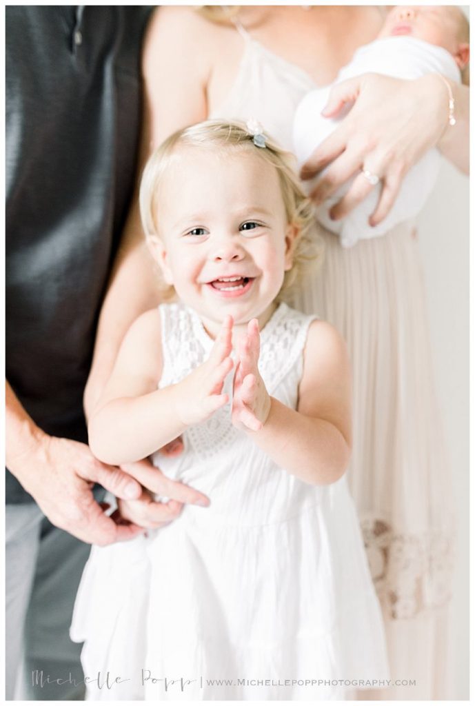 little girl clapping hands