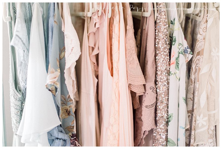 gowns organized and hanging in closet