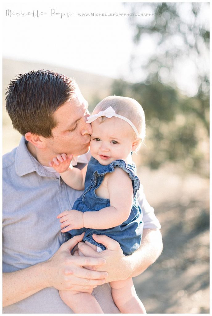 dad with one year old daughter