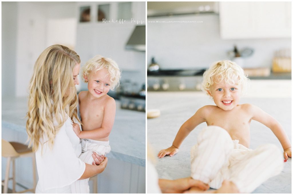 mama holding son in kitchen