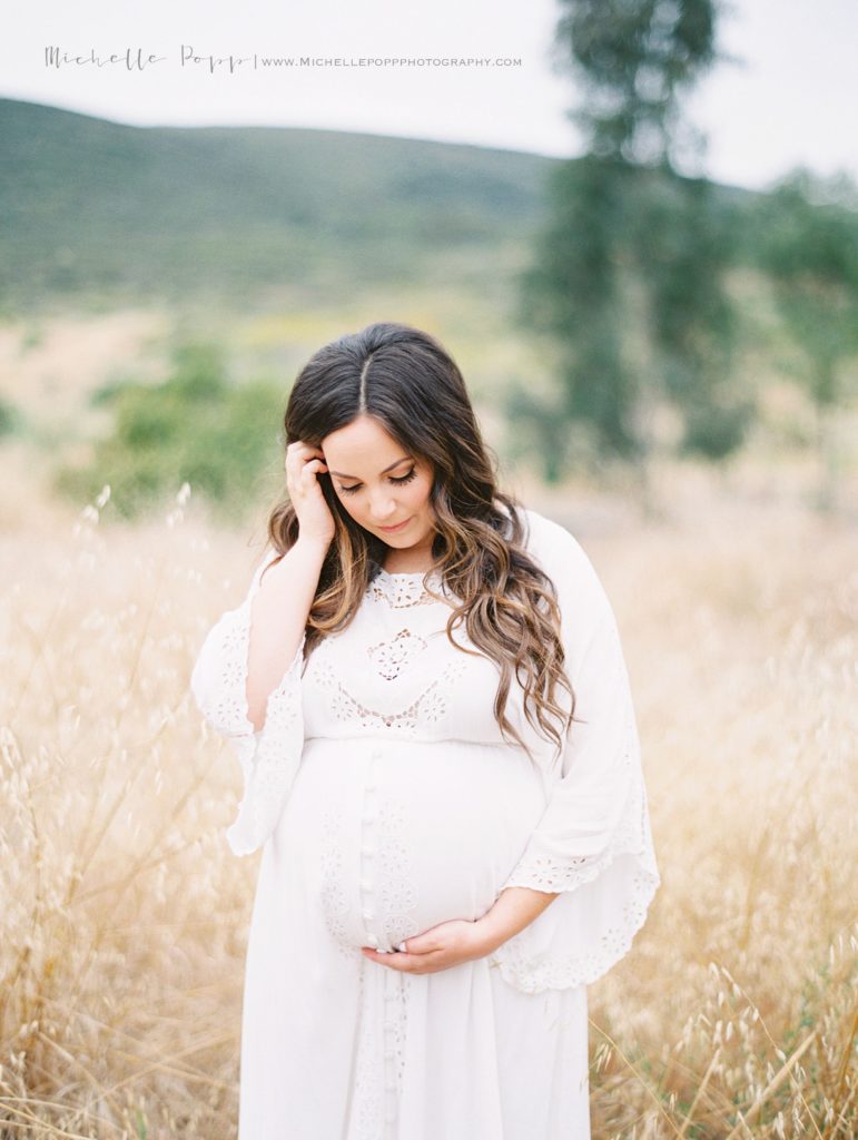 maternity portrait in a field in North County San Diego