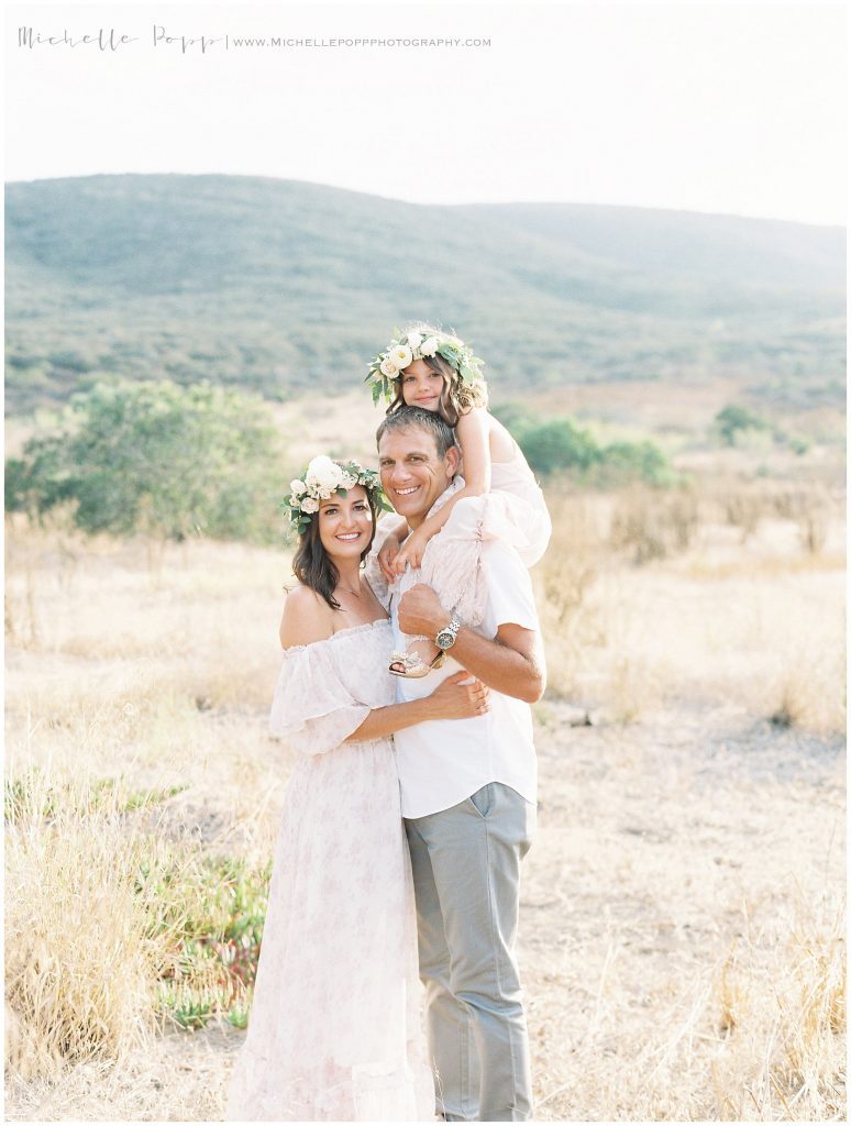 family standing in field  north county san diego family photographer