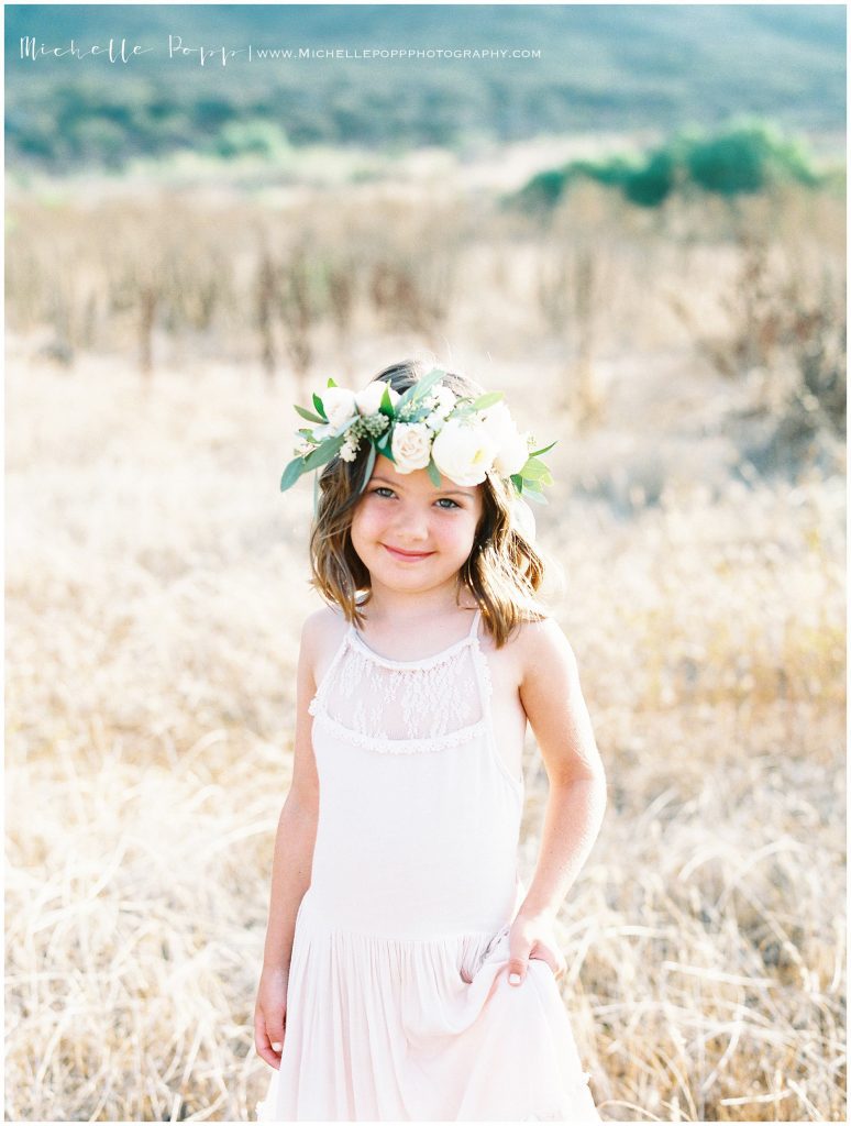 little girl wearing a flower crown