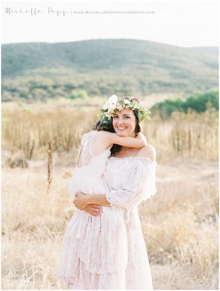 mom holding daughter in her arms