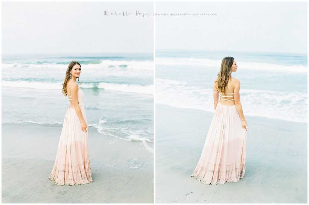 woman walking on the beach in pink dress