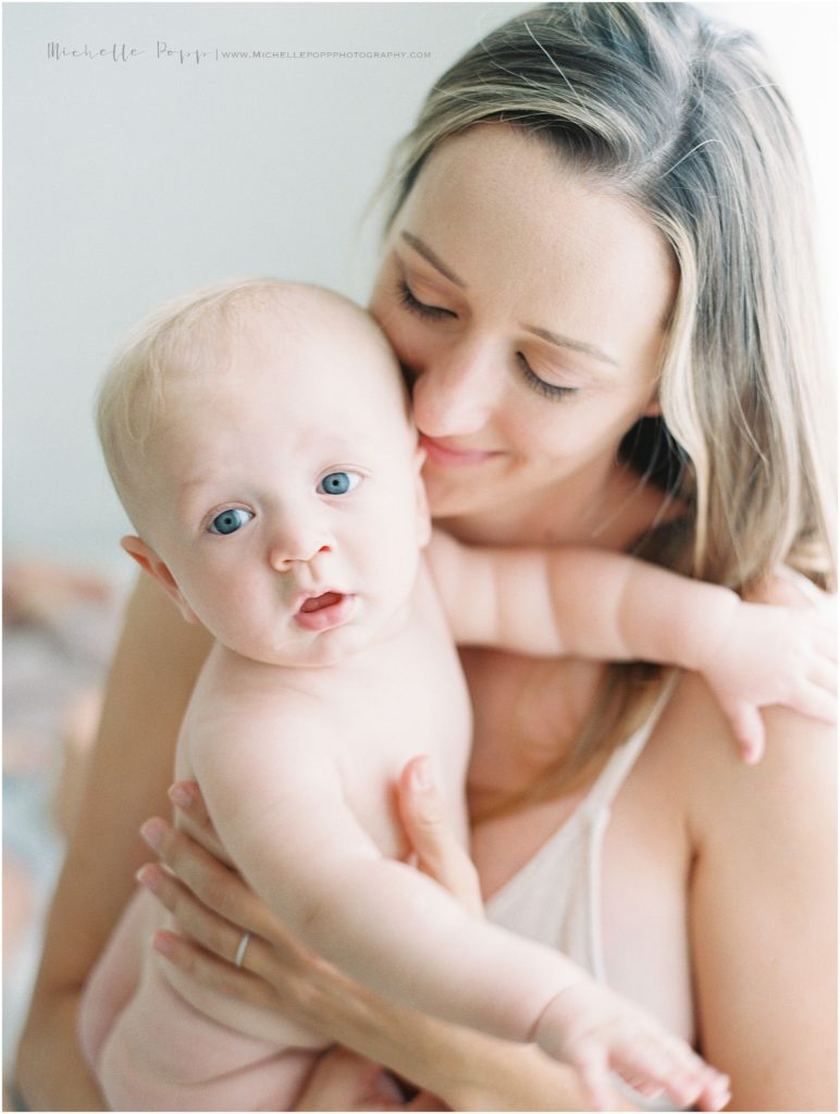 snuggling 6 month old baby