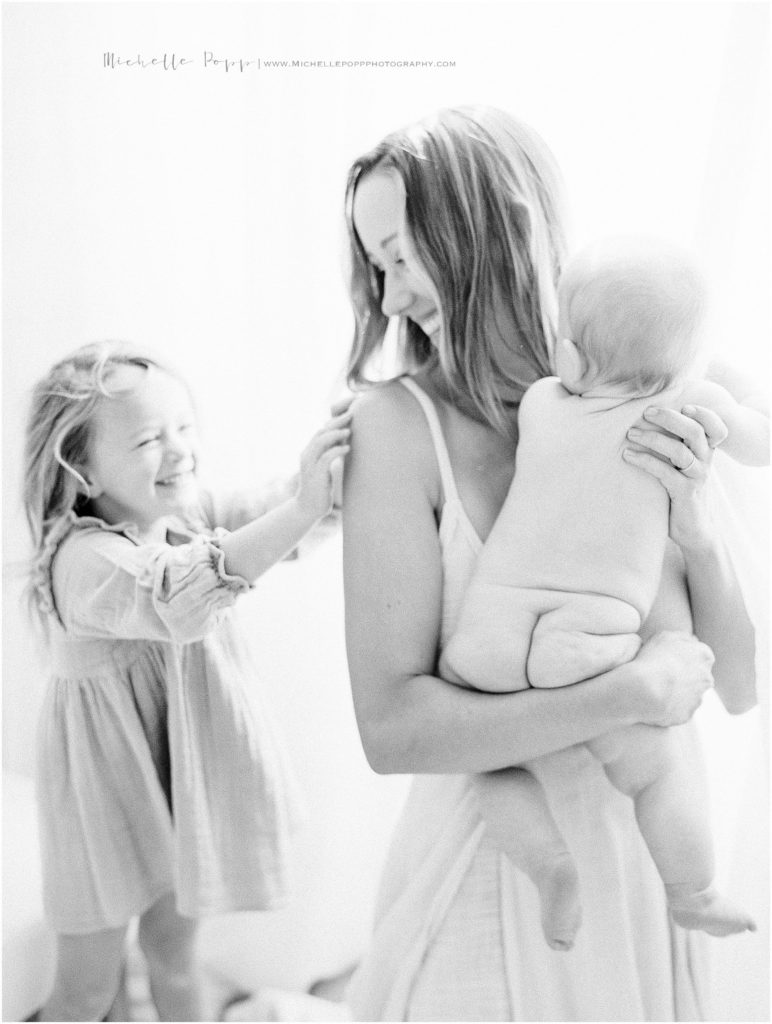 daughter tickling mom