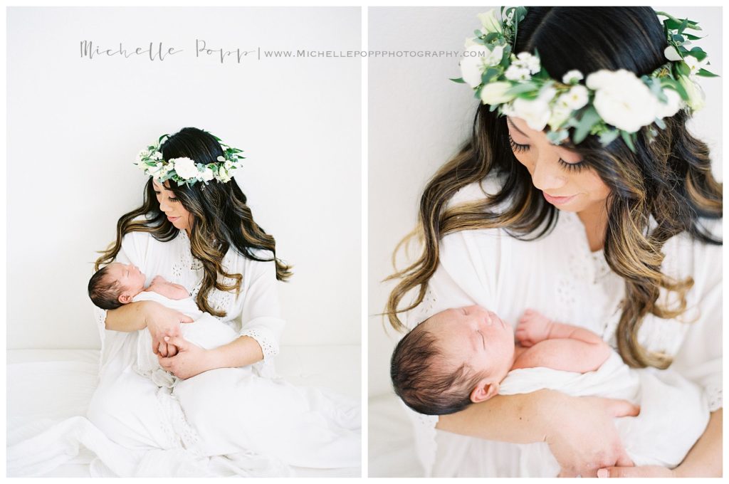 mom with floral crown holding baby