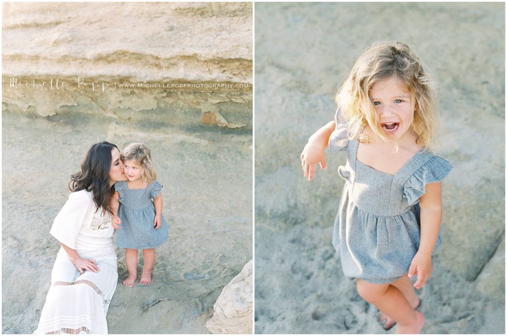 mom kissing daughter on cheek 