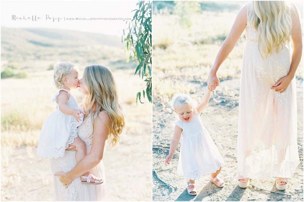 mon holding daughter in maternity photos in North County San Diego